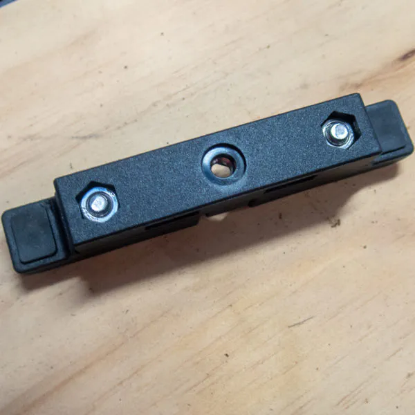 Topeak Omni Quicktrack Adapter mounting bracket, for attaching the adapter to a standard bike rack. The ends can be adjusted to fit wide or narrow racks but don’t swivel/pivot.