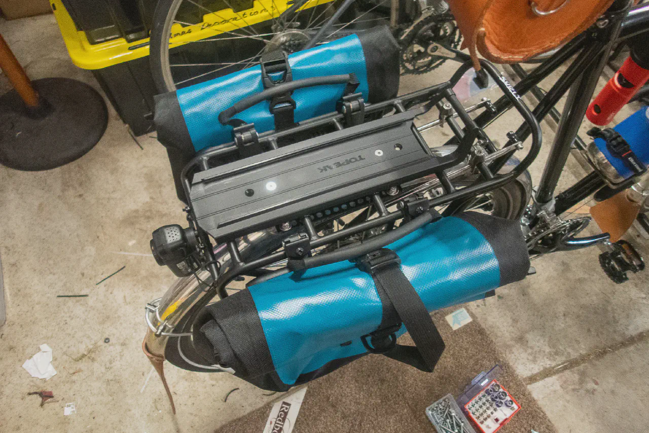 Rack can now carry either Topeak MTX bags/carts/etc or Ortlieb panniers without changing setup.