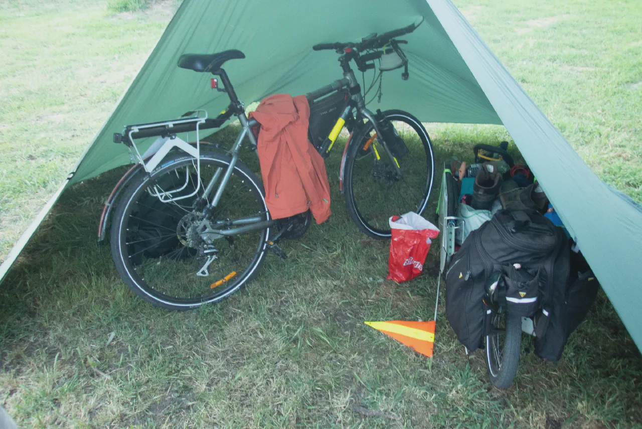 Camp setup under a tarp to keep my gear dry