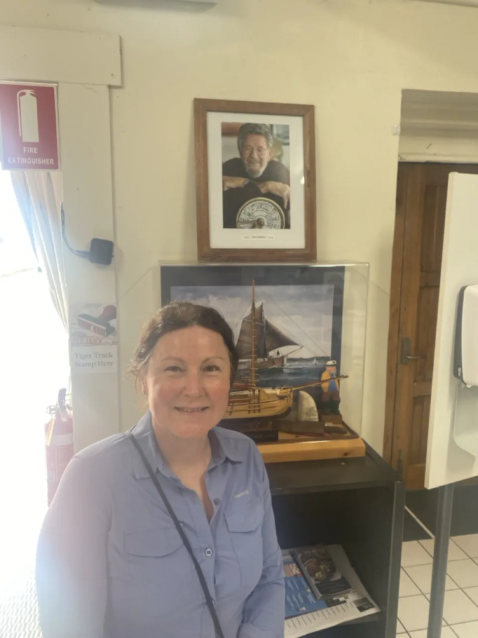 Danielle at the Bass &amp; Flinders Maritime Museum with a photo of Uncle Bern in the background